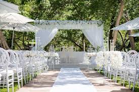 Elegant outdoor wedding aisle and ceremony setup